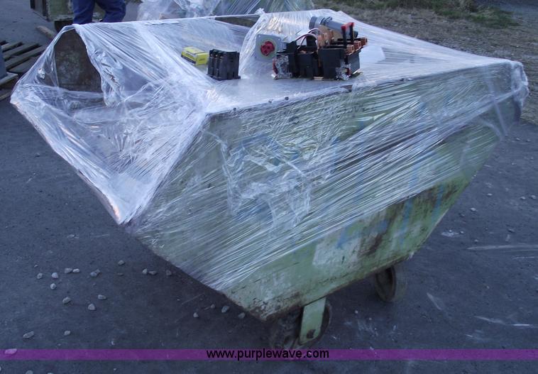 image for item E9565 Dump cart full of assorted industrial electric parts