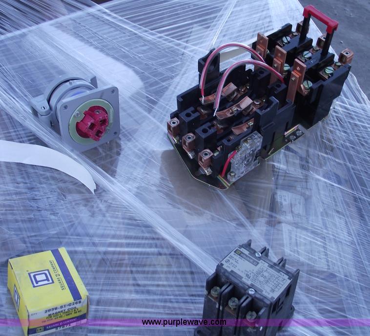 image for item E9565 Dump cart full of assorted industrial electric parts