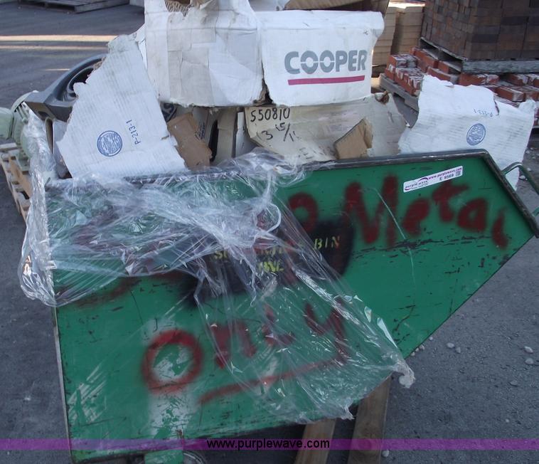 image for item E9570 Three wheel dump cart filled with assorted  bearings and seals