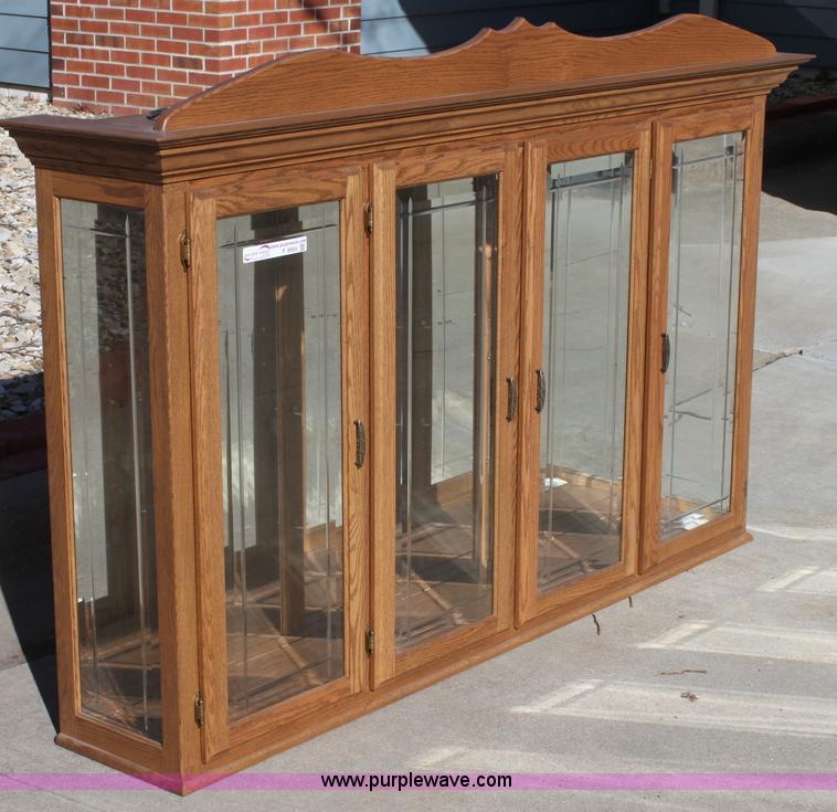 image for item F9955 Solid oak lighted china cabinet with hutch