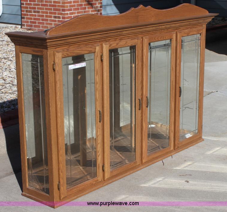 image for item F9955 Solid oak lighted china cabinet with hutch