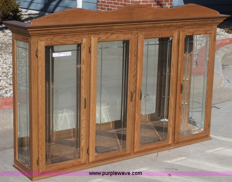 image for item F9955 Solid oak lighted china cabinet with hutch
