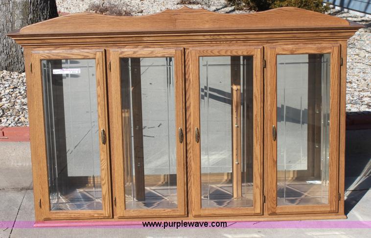 image for item F9955 Solid oak lighted china cabinet with hutch