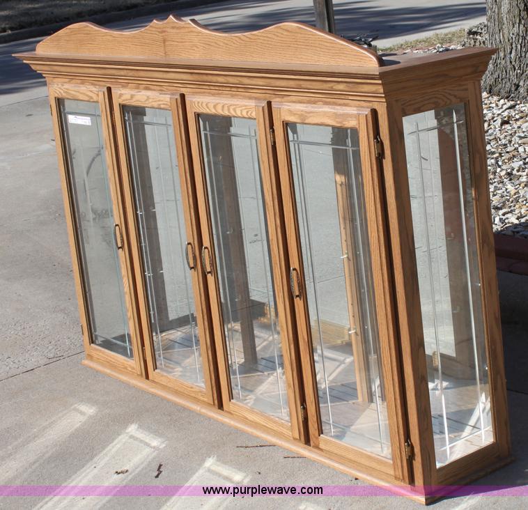 image for item F9955 Solid oak lighted china cabinet with hutch