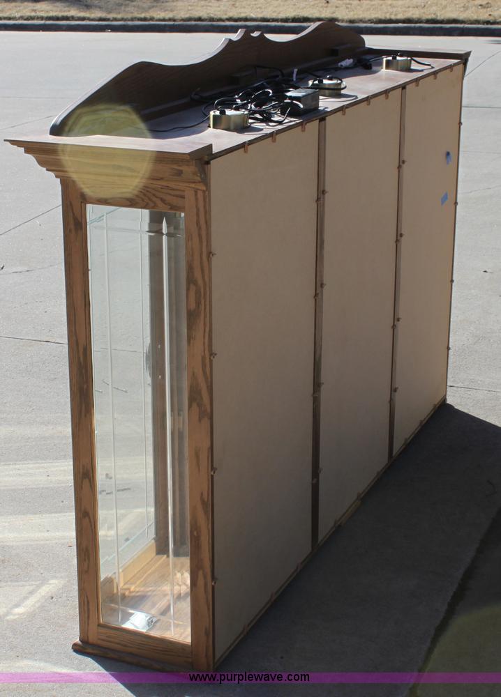 image for item F9955 Solid oak lighted china cabinet with hutch