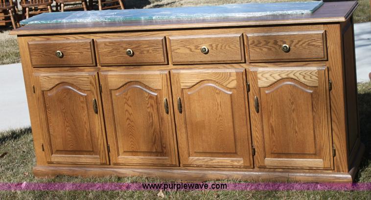 image for item F9955 Solid oak lighted china cabinet with hutch