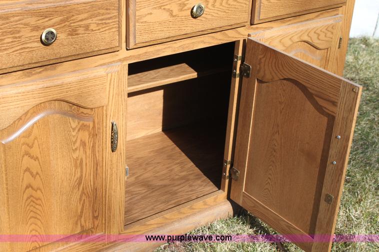 image for item F9955 Solid oak lighted china cabinet with hutch