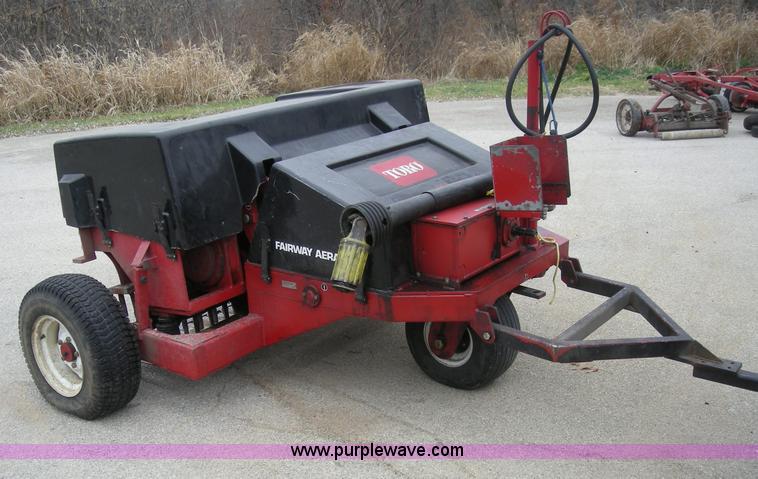 image for item I9752 1991 Toro 09501 pull behind fairway aerator
