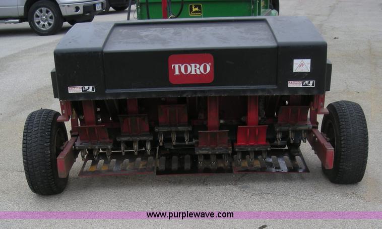 image for item I9752 1991 Toro 09501 pull behind fairway aerator