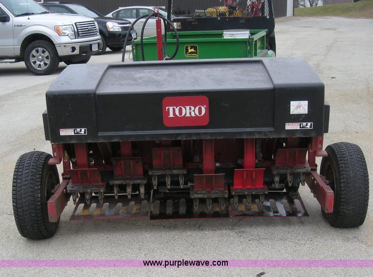 image for item I9752 1991 Toro 09501 pull behind fairway aerator
