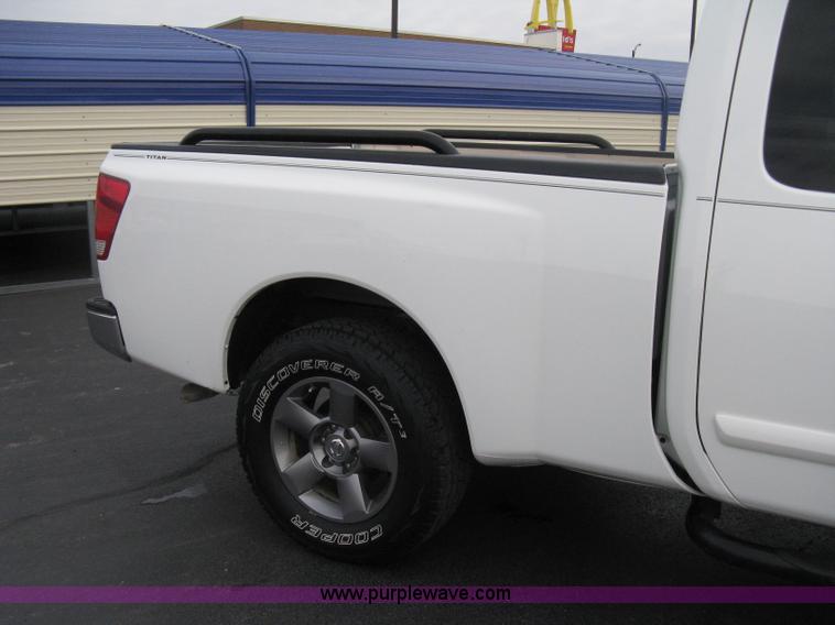 image for item A6040 2005 Nissan Titan SE king cab pickup truck
