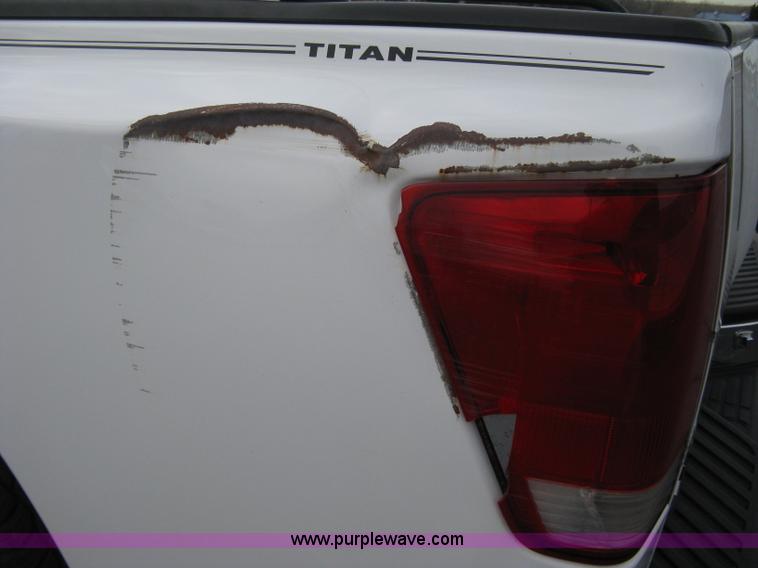 image for item A6040 2005 Nissan Titan SE king cab pickup truck