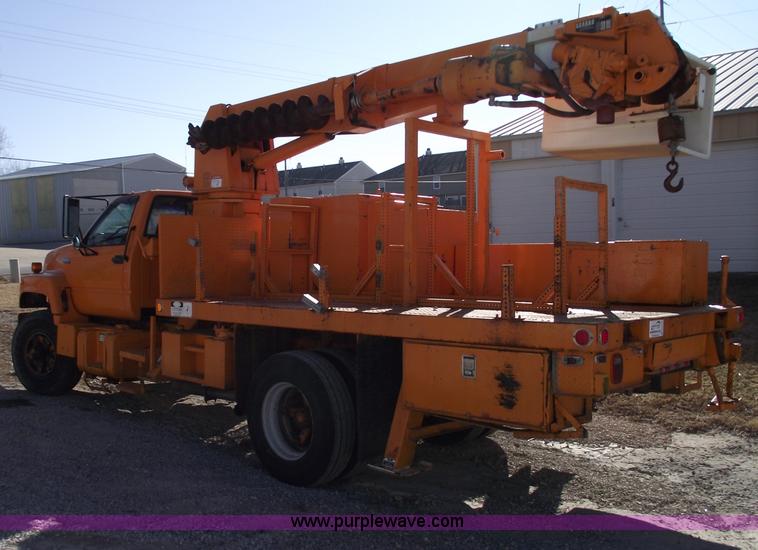 image for item B6118 1993 GMC TopKick digger derrick truck