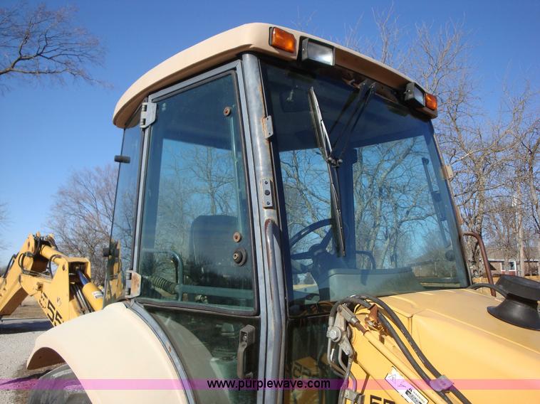 image for item A1821 1999 New Holland 555E backhoe