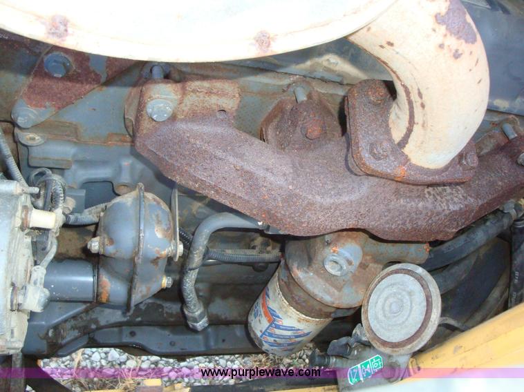 image for item A1821 1999 New Holland 555E backhoe