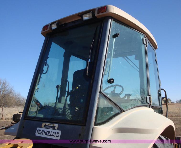 image for item A1821 1999 New Holland 555E backhoe