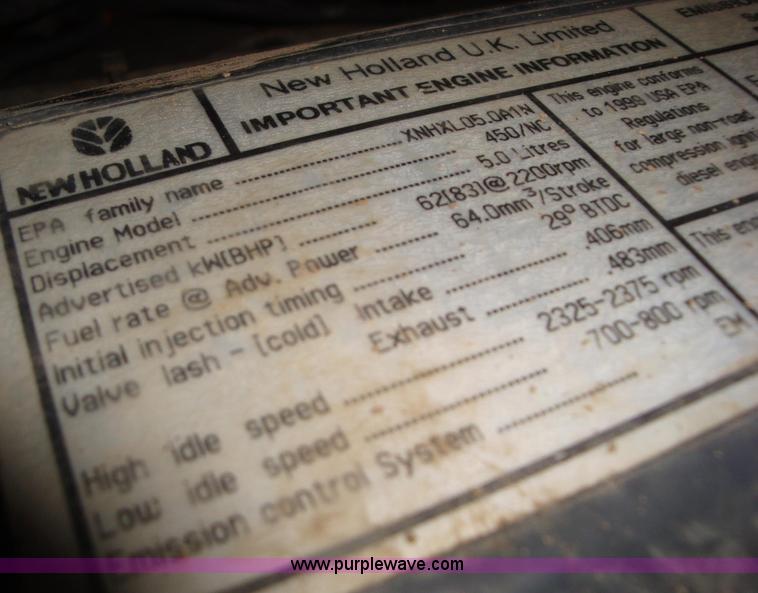 image for item A1821 1999 New Holland 555E backhoe