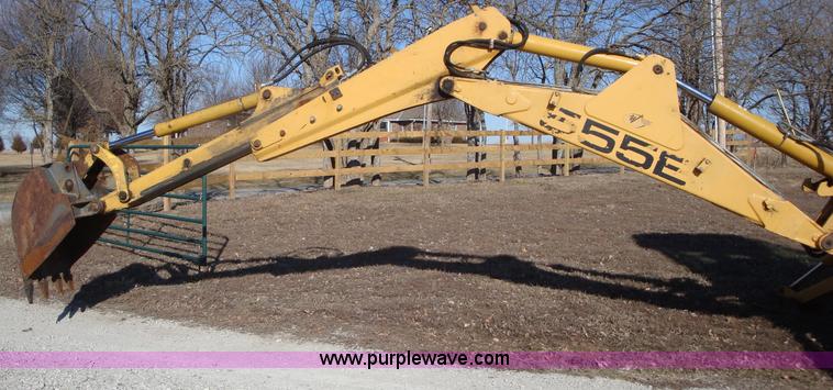 image for item A1821 1999 New Holland 555E backhoe