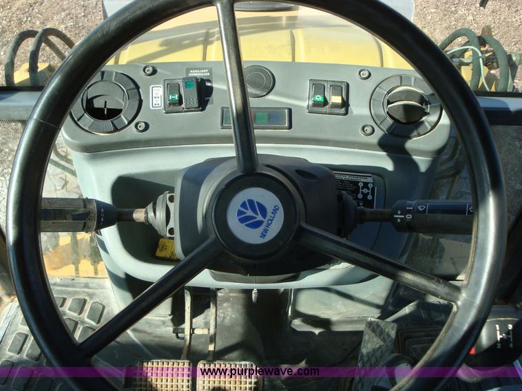 image for item A1821 1999 New Holland 555E backhoe