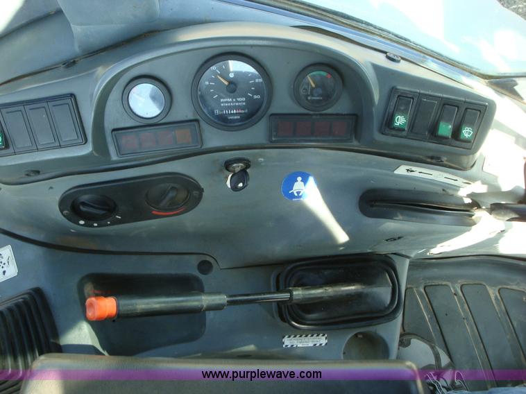 image for item A1821 1999 New Holland 555E backhoe