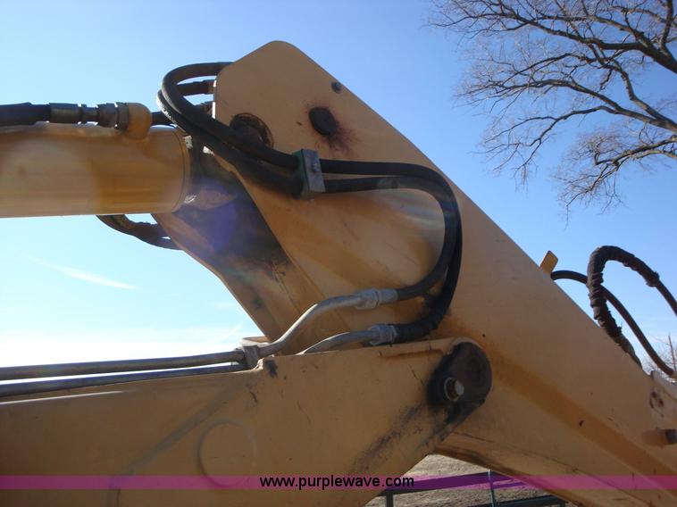 image for item A1821 1999 New Holland 555E backhoe