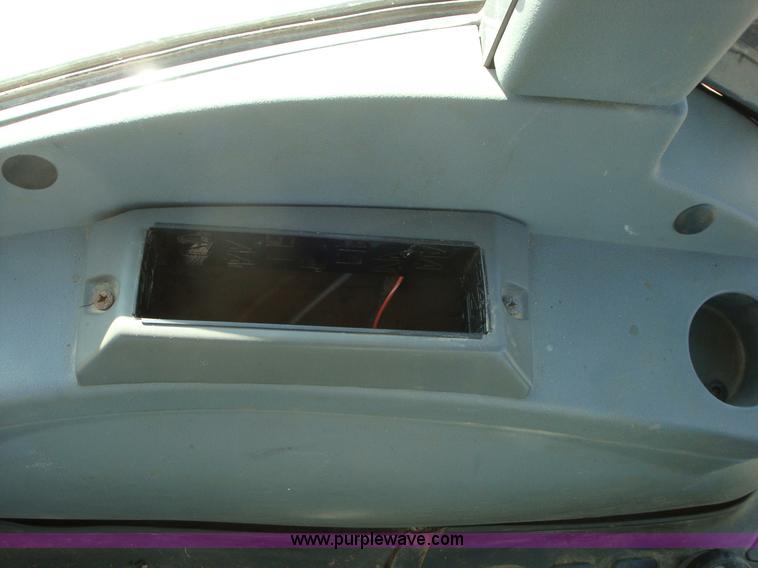 image for item A1821 1999 New Holland 555E backhoe