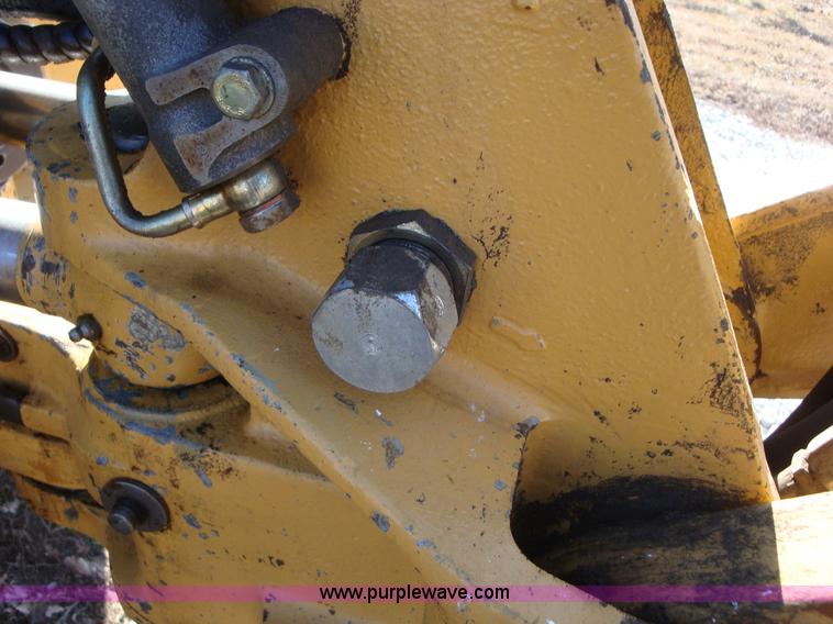 image for item A1821 1999 New Holland 555E backhoe