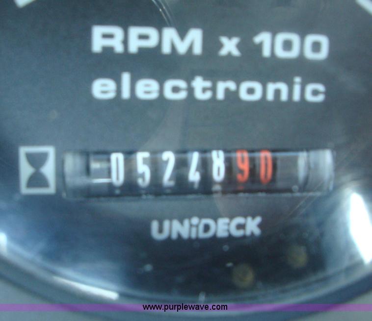 image for item A1821 1999 New Holland 555E backhoe