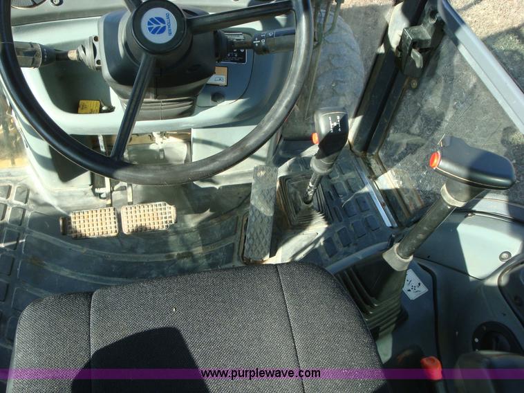 image for item A1821 1999 New Holland 555E backhoe