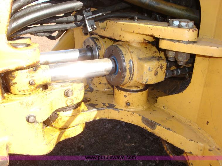 image for item A1821 1999 New Holland 555E backhoe