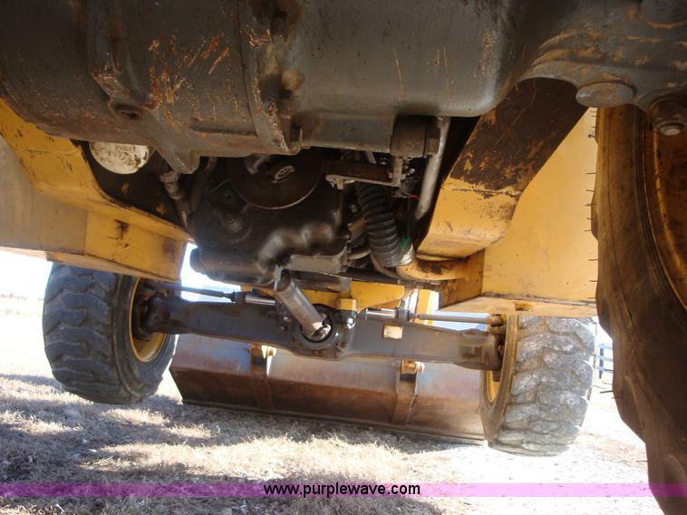 image for item A1821 1999 New Holland 555E backhoe