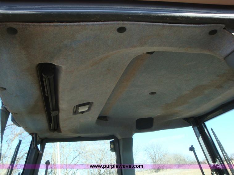 image for item A1821 1999 New Holland 555E backhoe