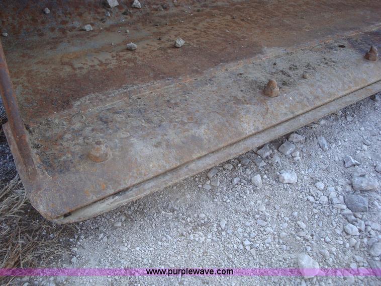 image for item A1821 1999 New Holland 555E backhoe