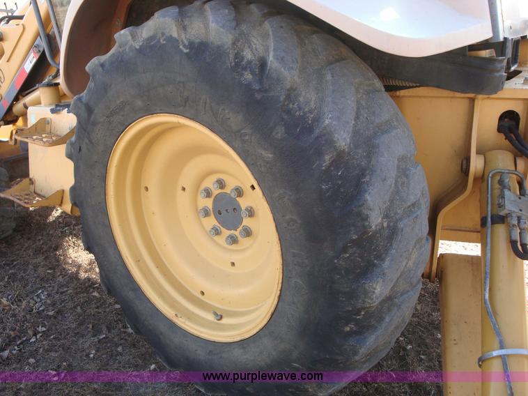 image for item A1821 1999 New Holland 555E backhoe