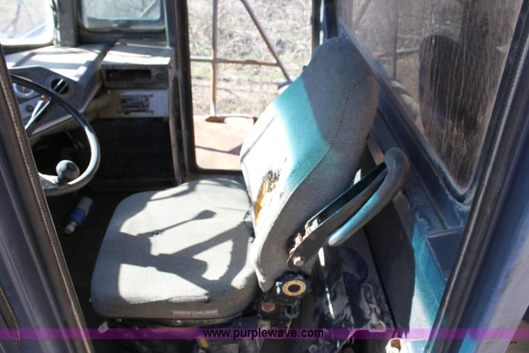 image for item B8781 2000 John Deere 350C 6x6 articulating dump truck