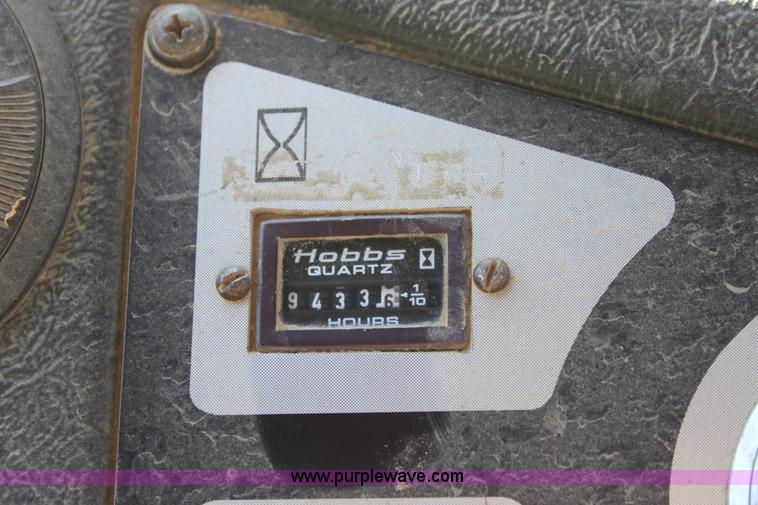 image for item B8781 2000 John Deere 350C 6x6 articulating dump truck