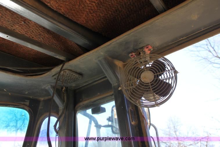 image for item B8781 2000 John Deere 350C 6x6 articulating dump truck