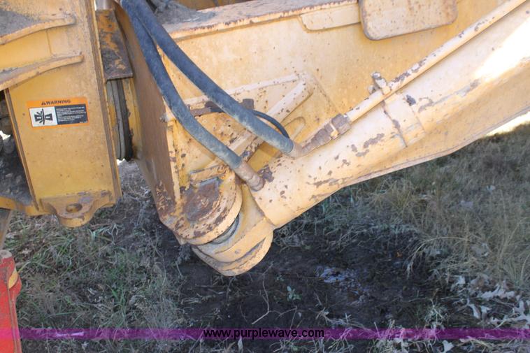 image for item B8781 2000 John Deere 350C 6x6 articulating dump truck