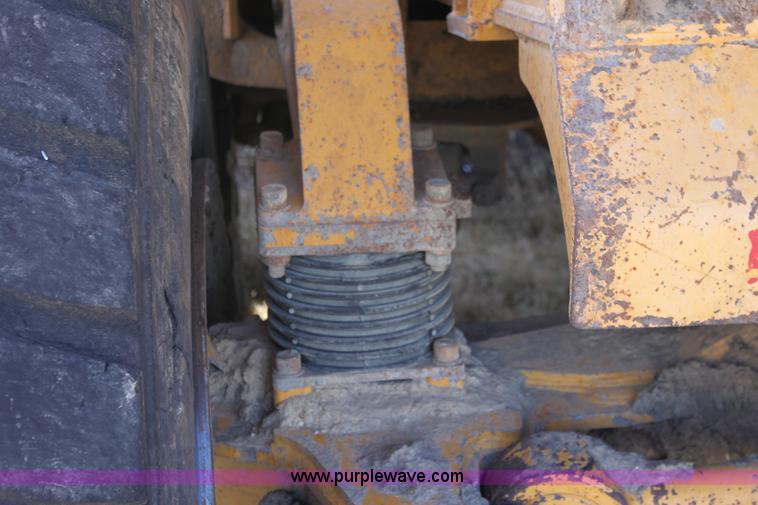 image for item B8781 2000 John Deere 350C 6x6 articulating dump truck