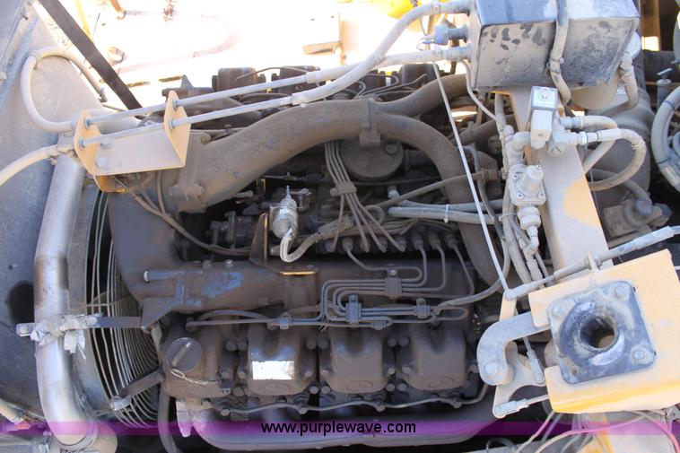 image for item B8781 2000 John Deere 350C 6x6 articulating dump truck