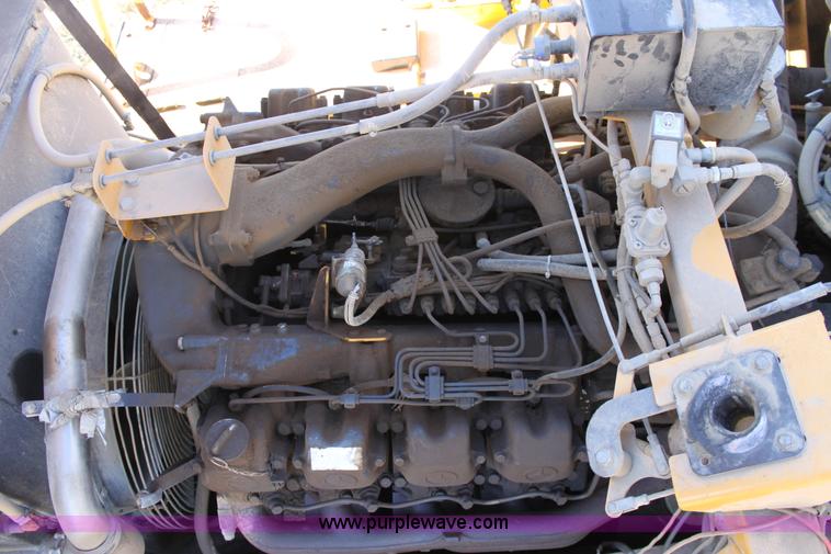 image for item B8781 2000 John Deere 350C 6x6 articulating dump truck