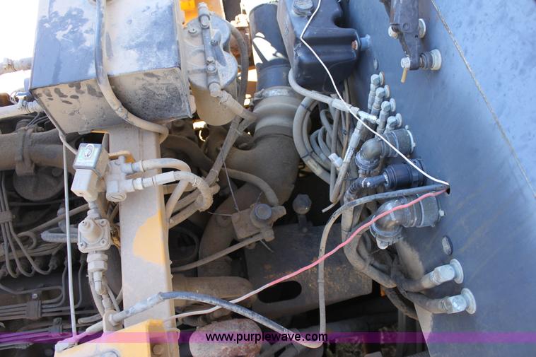 image for item B8781 2000 John Deere 350C 6x6 articulating dump truck