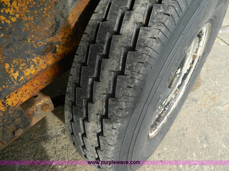 image for item C9485 1997 tilt bed trailer