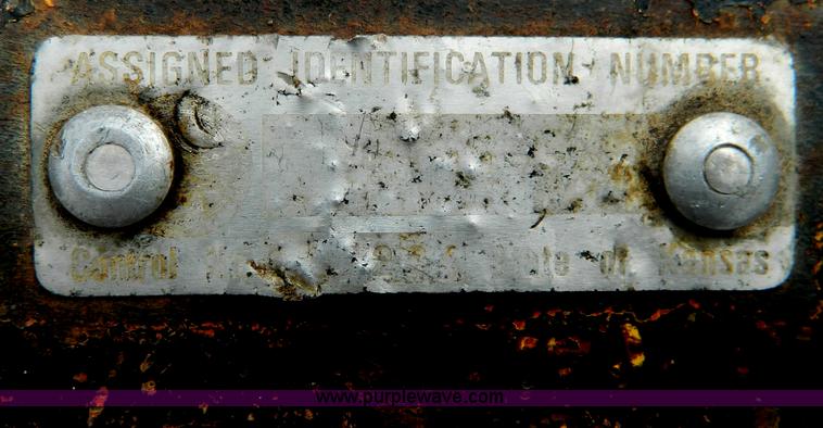 image for item C9485 1997 tilt bed trailer