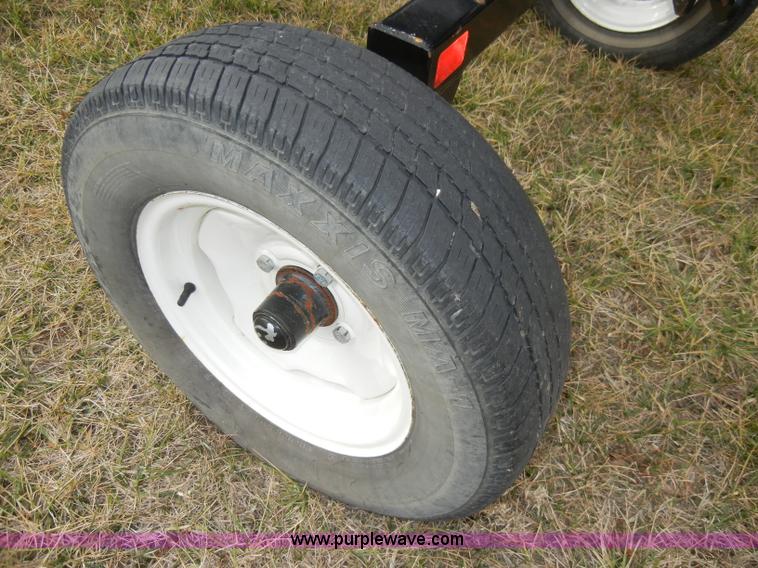 image for item A6686 KM Rake Caddy 8 wheel rake