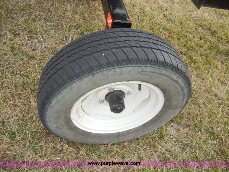 image for item A6686 KM Rake Caddy 8 wheel rake