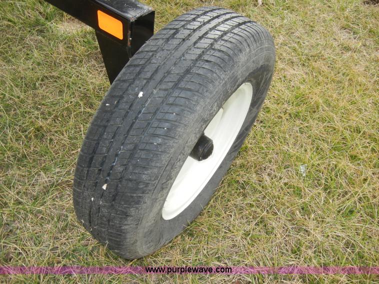 image for item A6688 KM Rake Caddy 8 wheel rake