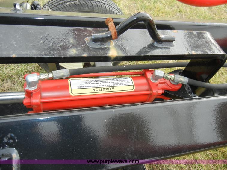 image for item A6688 KM Rake Caddy 8 wheel rake