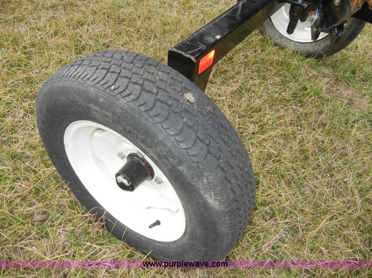 image for item A6689 KM Rake Caddy 8 wheel rake