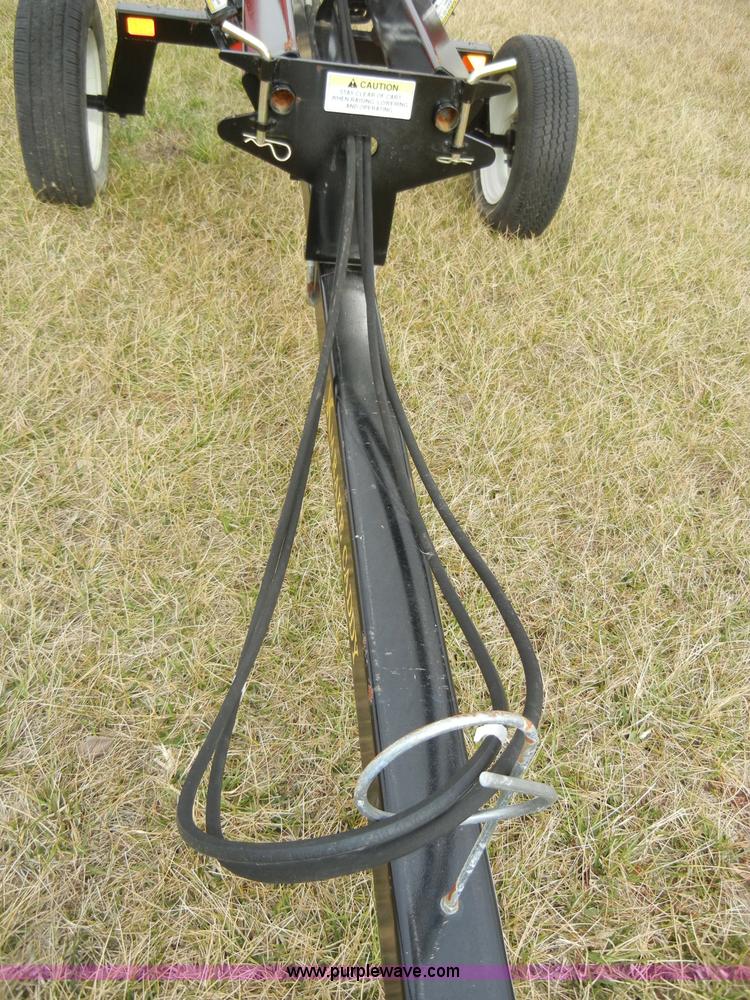 image for item A6689 KM Rake Caddy 8 wheel rake